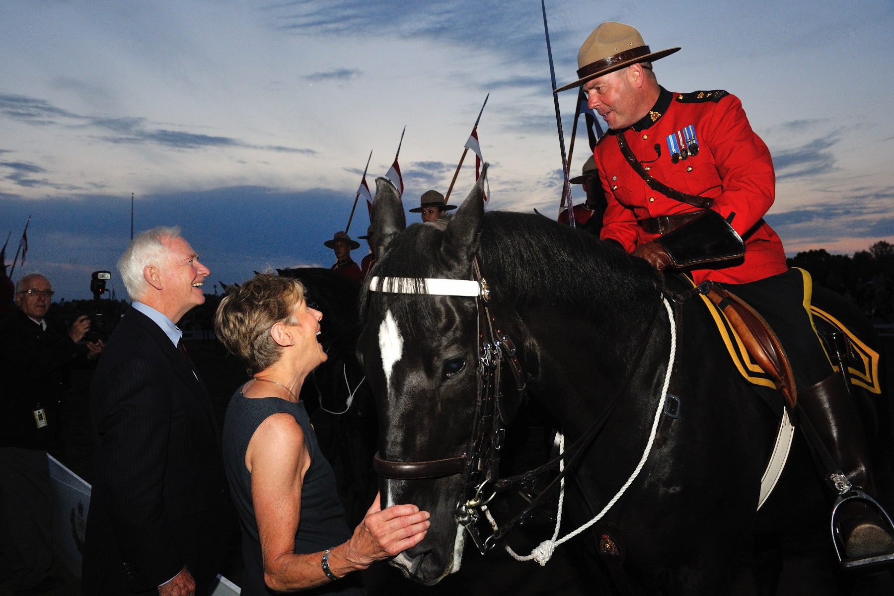 Their Excellencies congratulated Superintendent Marty Chesser on the Musical Ride's spectacular performence. 