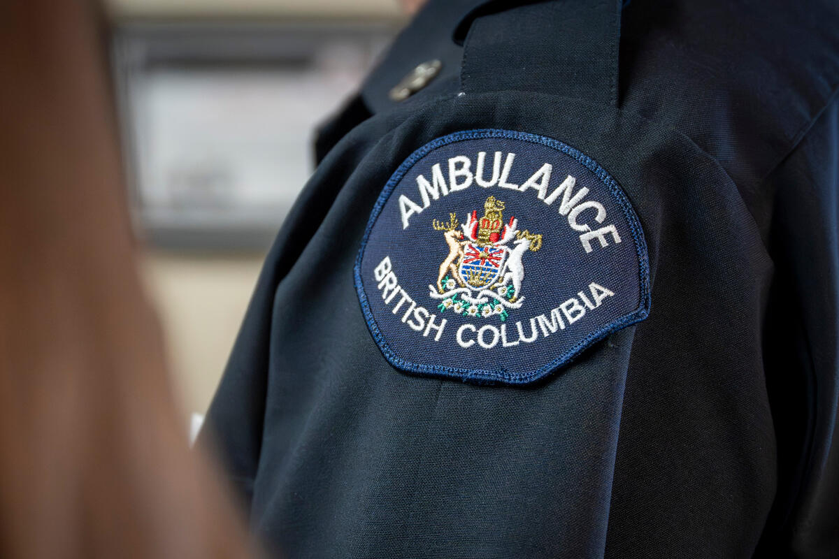 Ambulance British Columbia badge sewn on a person's sleeve.
