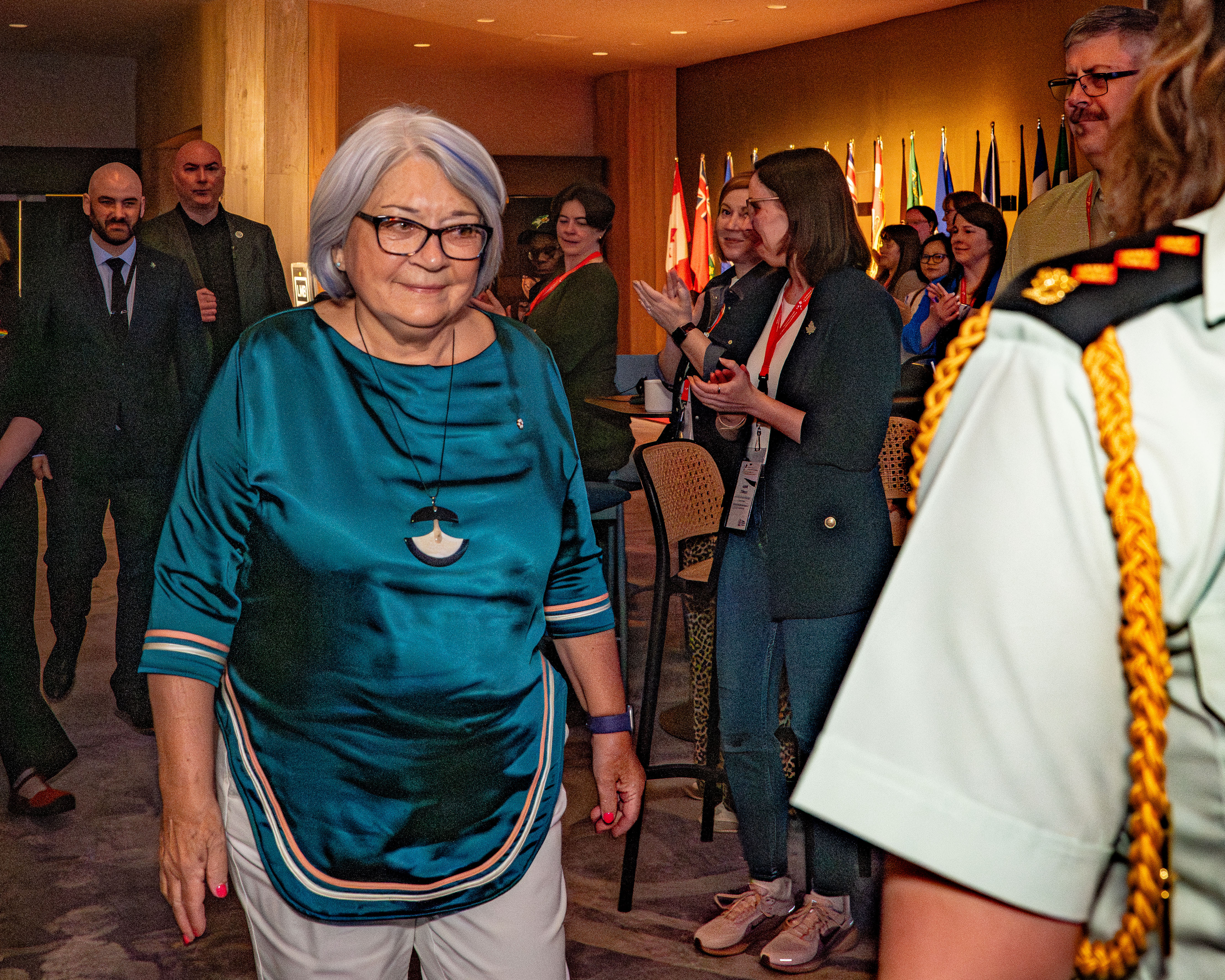 Governor General Mary Simon walking in a room.