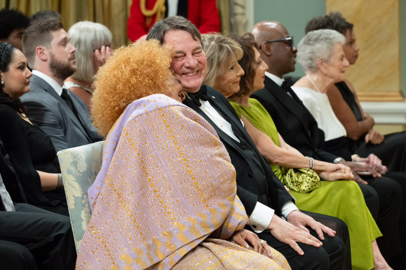 Measha Brueggergosman-Lee leans onto Ronnie Burkett’s shoulder in the Ballroom at Rideau Hall