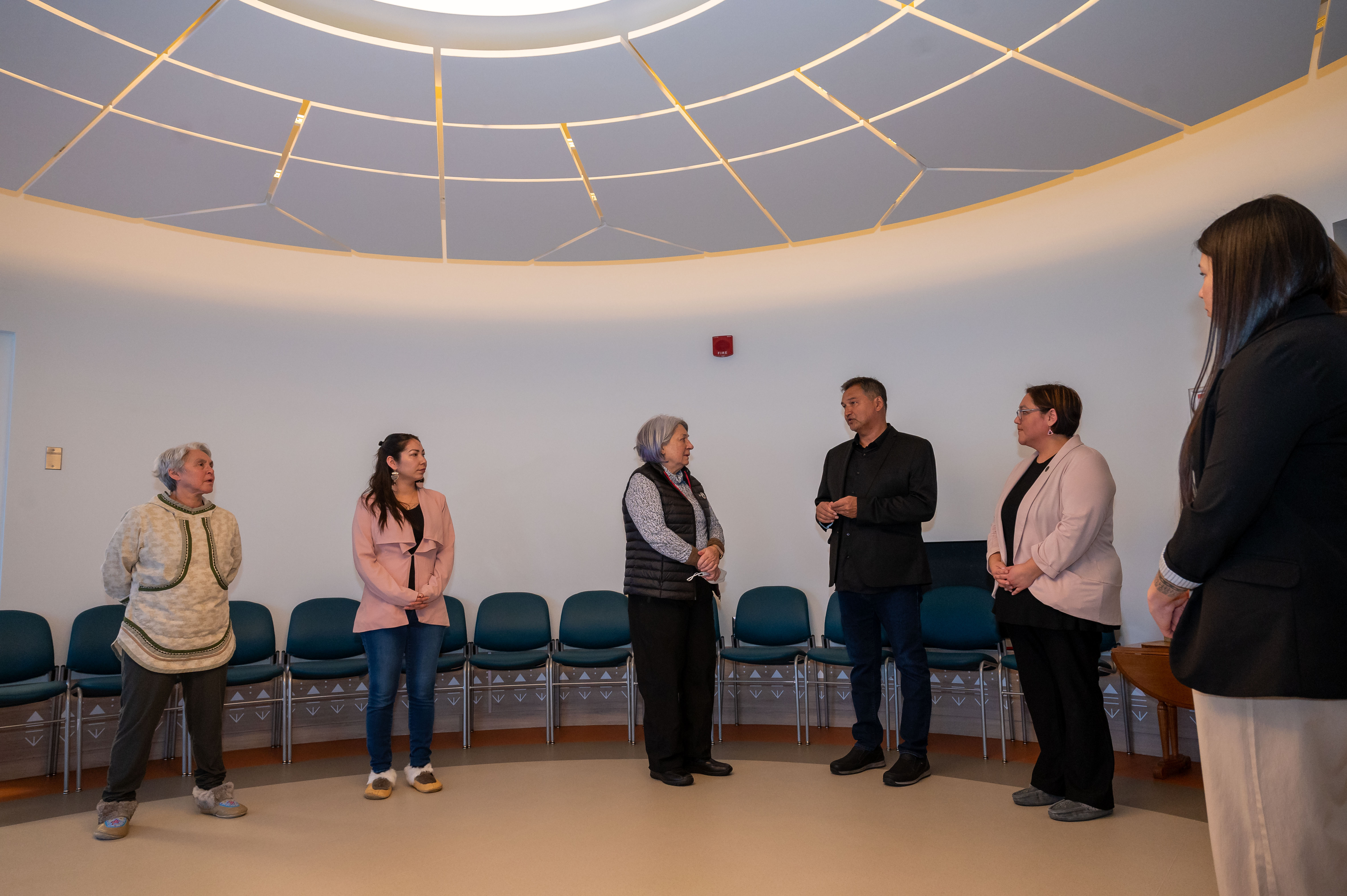 Governor General Mary Simon speaks with staff members
