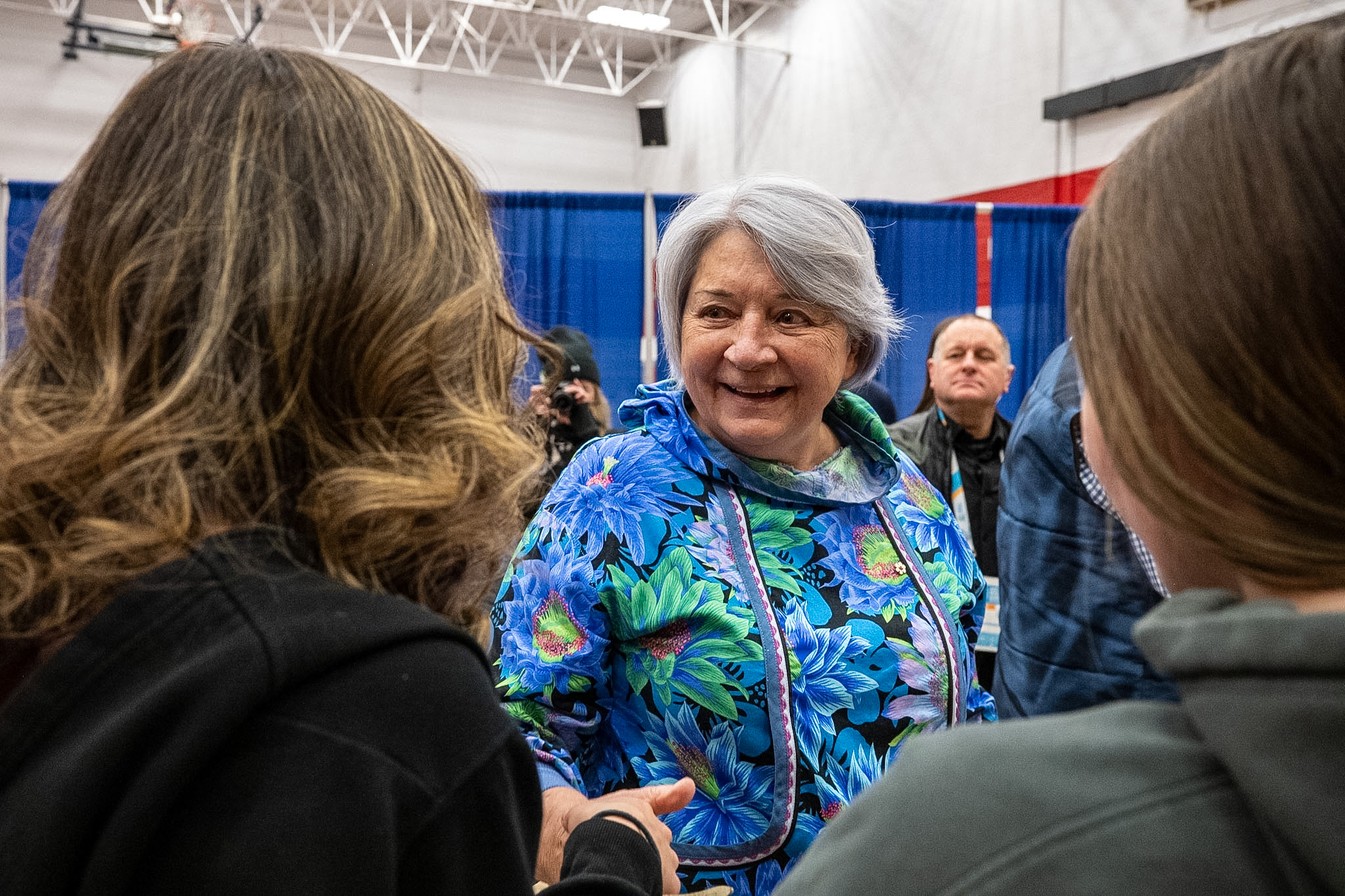 Governor General Mary Simon smilling at another individual.