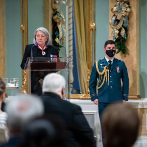 Governor General Mary Simon stands at a podium addressing the audience.