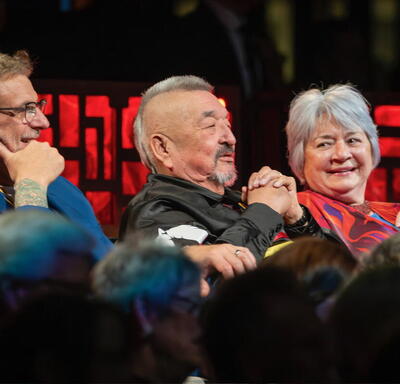 Governor General Mary Simon and laureates enjoying the performances at the A group of performers singing on stage at the Governor General's Performing Arts Awards Gala.