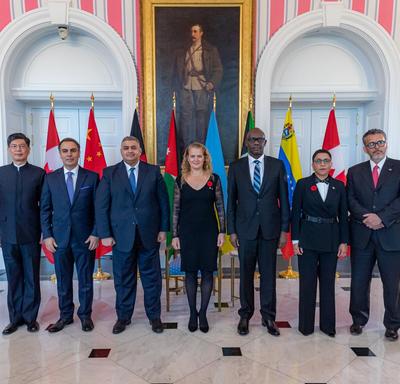 The new heads of mission pose for a group photo with the Governor General. 