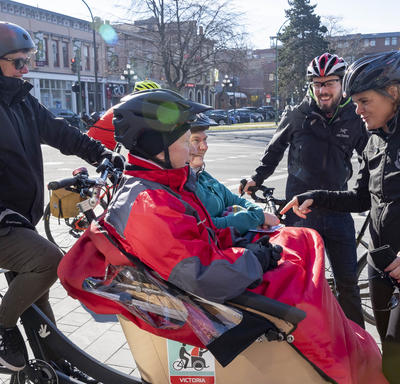 The Governor General spoke with cyclists. 