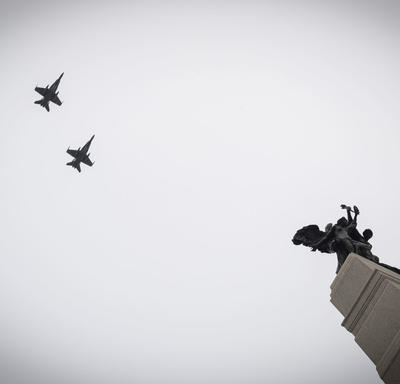 A photo of aircraft conducting the fly past during the National Remembrance Day Ceremony.