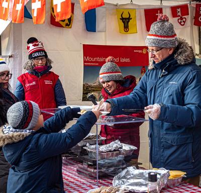Many embassies offered delicious snacks and warm drinks to help keep visitors warm. The Embassy of Switzerland served raclette.