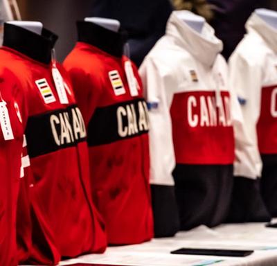 A photo of Canadian Olympic gear on mannequins. 