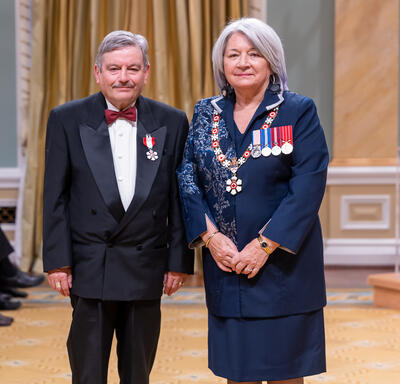Jean-Paul Grappe is standing next to the Governor General.