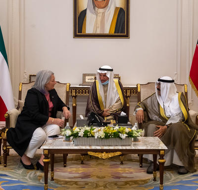 Governor General Mary Simon is talking with His Highness Sheikh Mishal Al-Ahmad Al-Jaber Al-Sabah, the Crown Prince of Kuwait. His advisor is sitting in between them. 
