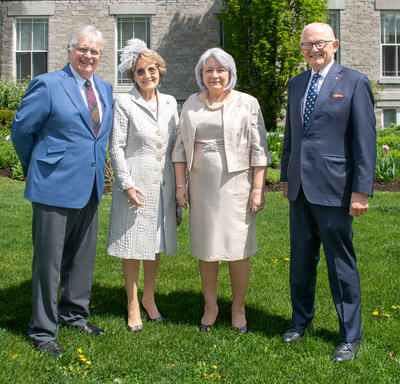 Their Excellencies are posing for a picture with Her Royal Highness Princess Margriet of the Netherlands and Professor Pieter van Vollenhoven outside of Rideau Hall.