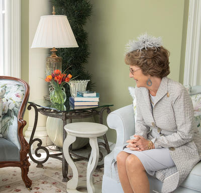 The Governor General is sitting across from Her Royal Highness Princess Margriet of the Netherlands inside Rideau Hall.
