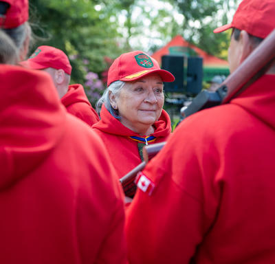 The Governor General is speaking with Canadian Rangers.
