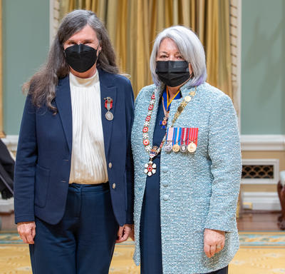 Catherine Elizabeth Thorn standing next to the governor general.
