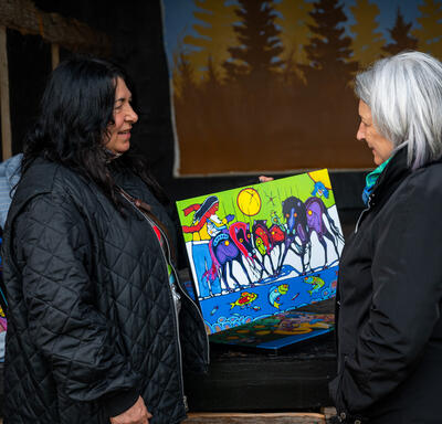 The Governor General is speaking with someone at the Summer Solstice Indigenous Festival.