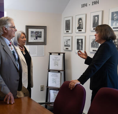Their Excellencies are standing in an office with Angélique Bernard, Commissioner of the Yukon.