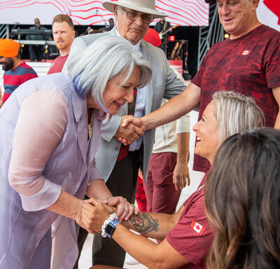 Governor General Mary Simon shaking a person's hand.