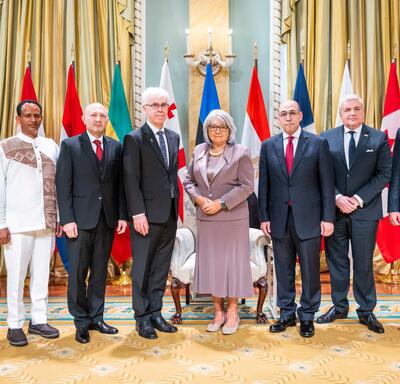 The Governor General poses for a photo with the new heads of mission.