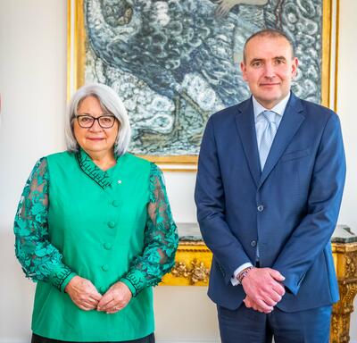 The Governor General is standing to the right of His Excellency, Guðni Thorlacius Jóhannesson, President of Iceland. 