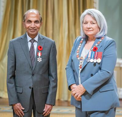 Jagmohan Humar is standing next to the Governor General.