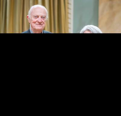 Harry Sheldon Swain is standing next to the Governor General.