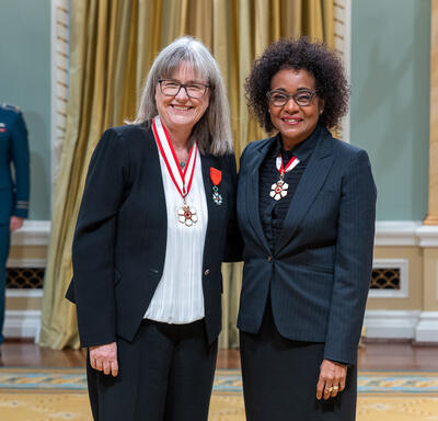 Donna Strickland is standing next to The Right Honourable Michaëlle Jean.