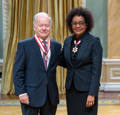 Raymond Bachand is standing next to The Right Honourable Michaëlle Jean.