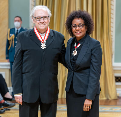 André Ménard is standing next to The Right Honourable Michaëlle Jean.