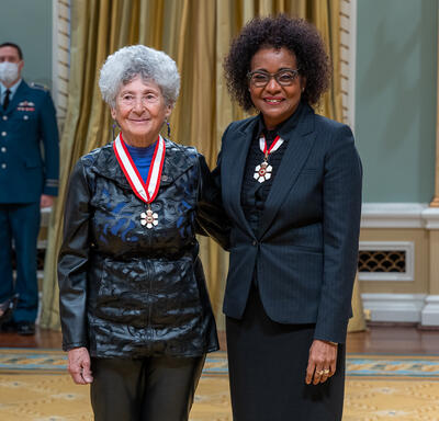 Karen Messing is standing next to The Right Honourable Michaëlle Jean.
