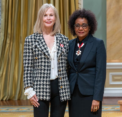 Mary Eberle Deacon is standing next to The Right Honourable Michaëlle Jean.