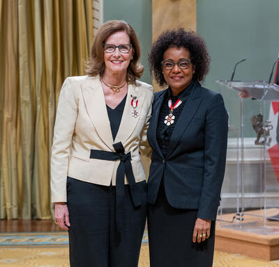 The Honourable Janis Guðrún Johnson is standing next to The Right Honourable Michaëlle Jean.