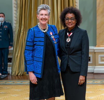 Suzanne Labarge is standing next to The Right Honourable Michaëlle Jean.