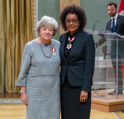 Sandra Pitblado is standing next to The Right Honourable Michaëlle Jean.