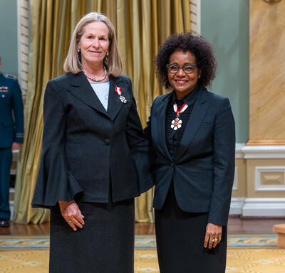 Jennifer Tory is standing next to The Right Honourable Michaëlle Jean.