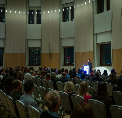 Wide view of the audience in the auditorium.