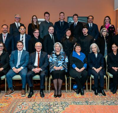 A group photo of recipients of the Governor General’s Architecture & Landscape Architecture awards. Governor General Simon is seated in the centre of the group.