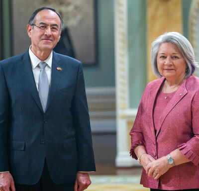 Governor General Simon is standing next to His Excellency Carlos Arturo Morales Lopez.