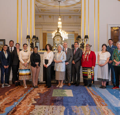 Governor General Mary Simon stands with members of the Canadian Delegation for the Coronation of His Majesty King Charles III