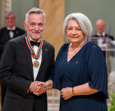 Governor General Marie Simon presents Michel Marc Bouchard with his Governor General’s Performing Arts Awards