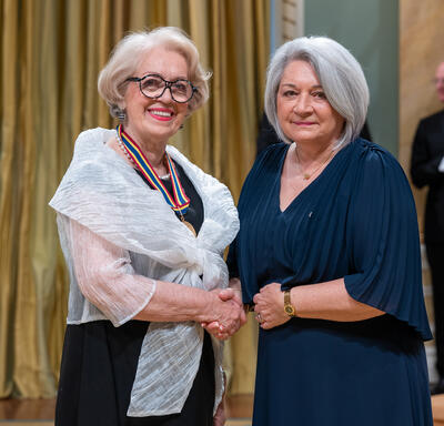 Governor General Marie Simon presents Rosemarie Landry with her Governor General’s Performing Arts Awards