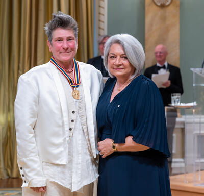 Governor General Marie Simon presents k.d. lang with her Governor General’s Performing Arts Awards