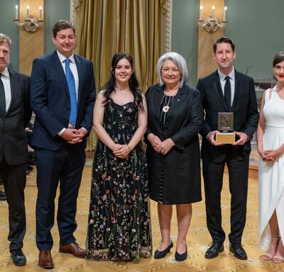 Governor General Marie Simon poses with Colin Freeze, Grant Robertson, Joe Friesen, Robyn Doolittle and Susan Krashinsky Robertson