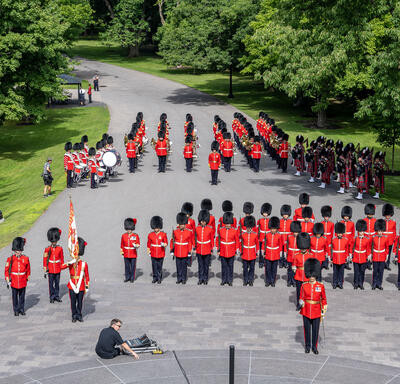 Ceremonial guard standing in front of Rideau Hall, awaiting the arrival of Governor General Marie Simon