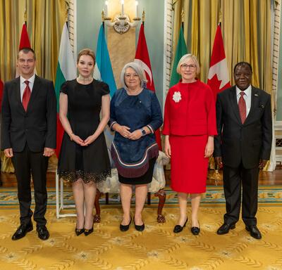 Governor General Marie Simon stands with the new heads of missions