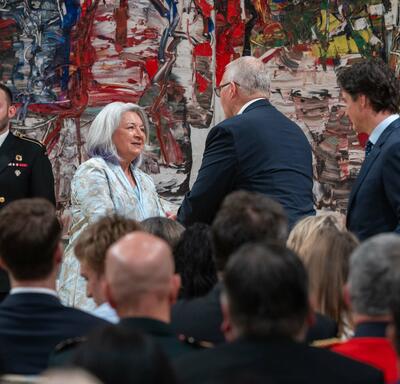 Governor General Marie Simon shakes hands with Minister Bill Blair