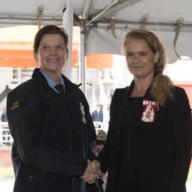 Next, Her Excellency presented Exemplary Service Medals to members of the Canadian Coast Guard.