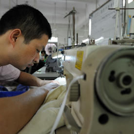 Visite à la fabrique de vêtements Guangda