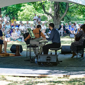 The Ladom Ensemble quartet performs on the grounds of Rideau Hall, under a tent, for Chamberfest.