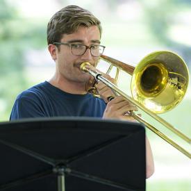 A trumpeter performs at Chamberfest 2018 on the grounds of Rideau Hall.
